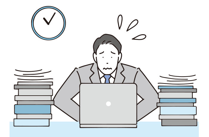 夜遅くまでの仕事でストレスを抱える男性のイラスト